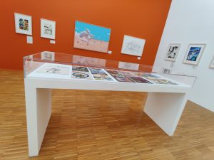 Table d'exposition autour de Pilote